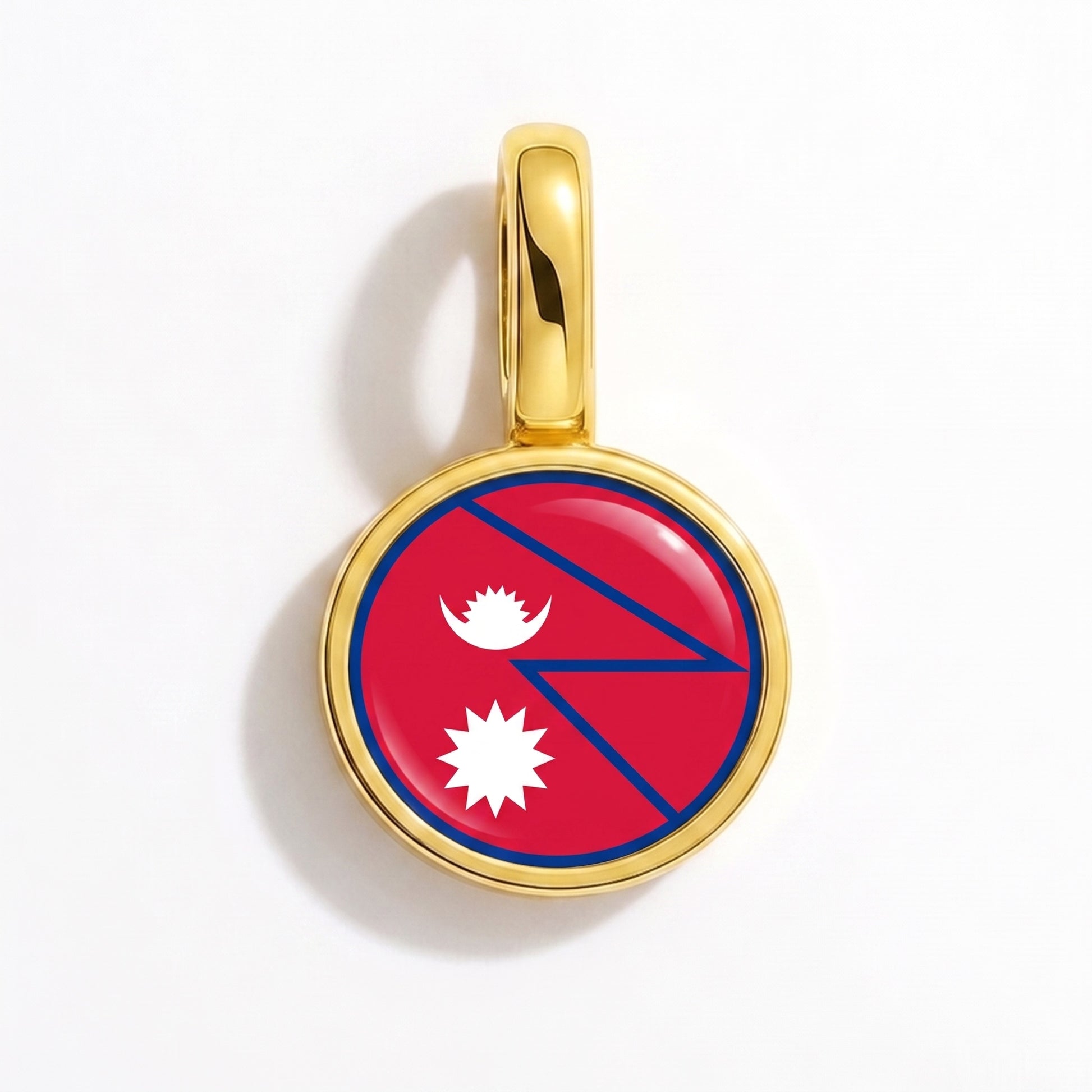 Charm vlag Nepal – rond goud